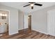An airy bedroom with luxury vinyl plank flooring and ceiling fan provides space for relaxation and style at 2624 Gary Rd, Rocky Mount, NC 27803