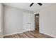 Comfortable bedroom offers laminate floors, a ceiling fan, and ample closet space at 2624 Gary Rd, Rocky Mount, NC 27803