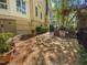 Cozy backyard patio with brick paving and built-in grill for outdoor enjoyment at 2701 Glenwood Gardens Ln, Raleigh, NC 27608