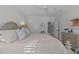 Inviting bedroom with neutral tones, ceiling fan, and ample natural light at 2701 Glenwood Gardens Ln, Raleigh, NC 27608