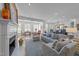 Spacious living room with fireplace, elegant furnishings, and plenty of natural light at 2701 Glenwood Gardens Ln, Raleigh, NC 27608