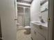 Bathroom features a vanity sink, toilet, and glass shower at 2710 Delaney Dr, Burlington, NC 27215