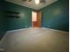 Inviting bedroom features painted walls, neutral carpet, and a ceiling fan at 2710 Delaney Dr, Burlington, NC 27215
