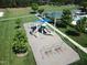 Community playground featuring slides, swings and climbing area providing fun and recreation for  at 277 High Ridge Ln, Pittsboro, NC 27312
