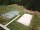 View of basketball and volleyball court surrounded by lush green space, perfect for community recreation at 277 High Ridge Ln, Pittsboro, NC 27312