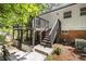 Multi-level deck and patio area with stairs leading to the backyard at 2904 Sprucewood Dr, Durham, NC 27707