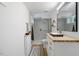 Stylish bathroom featuring modern vanity, sleek fixtures, and glass enclosed shower with elegant tile work at 2904 Sprucewood Dr, Durham, NC 27707