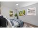 Inviting bedroom with large windows and a comfortable bed at 2904 Sprucewood Dr, Durham, NC 27707