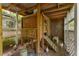 Enclosed chicken coop with a ramp, providing a safe and comfortable environment for raising chickens at 2904 Sprucewood Dr, Durham, NC 27707