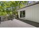 Large deck with sliding glass doors to the home's interior at 2904 Sprucewood Dr, Durham, NC 27707