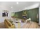 Open-concept living room with fireplace, modern decor, and seamless flow at 2904 Sprucewood Dr, Durham, NC 27707