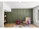 Cozy seating area with a small fireplace and decorative wall in neutral tones at 2904 Sprucewood Dr, Durham, NC 27707