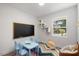 Bright playroom with a chalkboard, colorful rug, and cozy seating area, perfect for  at 2904 Sprucewood Dr, Durham, NC 27707