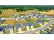 Aerial view of a well-planned residential community with green spaces and modern homes at 2923 Cullens Dr, Graham, NC 27253