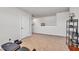 Finished basement area with neutral carpet and shelving provides flex space at 2923 Cullens Dr, Graham, NC 27253