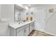 Bathroom featuring double sink vanity with wood-look flooring at 2923 Cullens Dr, Graham, NC 27253