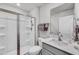Bathroom featuring a glass enclosed shower, white vanity with solid surface top, and modern fixtures at 2923 Cullens Dr, Graham, NC 27253