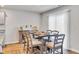 Inviting dining room with a wood table, seating for six, and lots of natural light at 2923 Cullens Dr, Graham, NC 27253