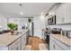 Spacious kitchen featuring granite countertops, stainless steel appliances, and ample cabinet space at 2923 Cullens Dr, Graham, NC 27253