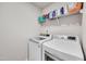 Laundry room featuring a white washer and dryer set at 2923 Cullens Dr, Graham, NC 27253