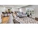 Inviting living room showcasing natural light, comfortable seating and an adjacent breakfast nook at 2923 Cullens Dr, Graham, NC 27253