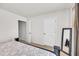 Partial view of main bedroom with multiple closets and an ensuite bathroom at 2923 Cullens Dr, Graham, NC 27253
