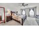 Relaxing main bedroom with dark wood furniture and ceiling fan at 2923 Cullens Dr, Graham, NC 27253
