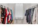 Bright walk-in closet featuring built-in shelving and a window with natural light at 2923 Cullens Dr, Graham, NC 27253