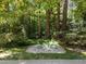 Unique backyard feature with decorative rocks and plantings, adding a touch of nature at 3203 Rugby Rd, Durham, NC 27707