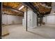 Unfinished basement area shows exposed ductwork and ceiling with sealed concrete floor and utility access at 3203 Rugby Rd, Durham, NC 27707