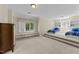 Spacious bedroom with custom-built bed areas and ample natural light at 3203 Rugby Rd, Durham, NC 27707