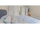 Bedroom with closet doors, views to bathroom and hall at 3203 Rugby Rd, Durham, NC 27707