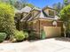Spacious two-car garage with a basketball hoop and ample parking space on the driveway at 3203 Rugby Rd, Durham, NC 27707