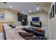 Finished basement featuring a wet bar, plush seating, and space for entertaining guests at 325 Hogans Valley Way, Cary, NC 27513