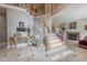 Grand foyer with a sweeping staircase, marble floors, and elegant decor at 325 Hogans Valley Way, Cary, NC 27513