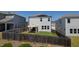 Backyard view with gazebo, fenced-in yard, and houses nearby at 33 White Ash Dr, Clayton, NC 27527
