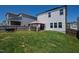 Landscaped backyard with green grass, a patio, and a gazebo at 33 White Ash Dr, Clayton, NC 27527