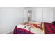 Bedroom featuring a bed, carpet, and access to a closet and hallway at 33 White Ash Dr, Clayton, NC 27527