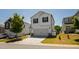 Charming two-story home with a manicured lawn, two-car garage, and a bright, modern exterior at 33 White Ash Dr, Clayton, NC 27527