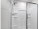 Bright shower featuring built-in shelves and a modern showerhead at 33 White Ash Dr, Clayton, NC 27527