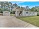 Lovely home featuring a covered porch with seating and a detached garage at 3312 Apache Dr, Raleigh, NC 27609