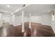 Large finished basement with hardwood floors, offering a versatile and open living space at 3420 Sheridan Dr, Durham, NC 27707