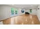 Finished basement with walkout doors and windows for natural light, perfect for entertaining and relaxation at 3420 Sheridan Dr, Durham, NC 27707