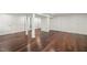 Finished basement featuring hardwood floors, a bathroom, and closet space, perfect for a Gathering at 3420 Sheridan Dr, Durham, NC 27707