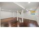 Bright basement with hardwood floors and natural light, offering a comfortable and inviting living space at 3420 Sheridan Dr, Durham, NC 27707
