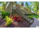 A beautiful brick home featuring meticulous landscaping and a welcoming brick stairway entrance at 3420 Sheridan Dr, Durham, NC 27707