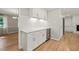 Well-appointed bar area with wine storage and counterspace, adjacent to living area at 3420 Sheridan Dr, Durham, NC 27707