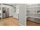 Kitchen view showcasing stainless steel appliances and walk-in pantry at 3420 Sheridan Dr, Durham, NC 27707