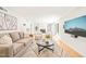Inviting living room with a cozy fireplace, neutral decor, and natural light at 3420 Sheridan Dr, Durham, NC 27707