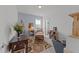 Well-lit bedroom with an accent wall, patterned rug and an easel at 353 Rivella Dr, Wake Forest, NC 27587